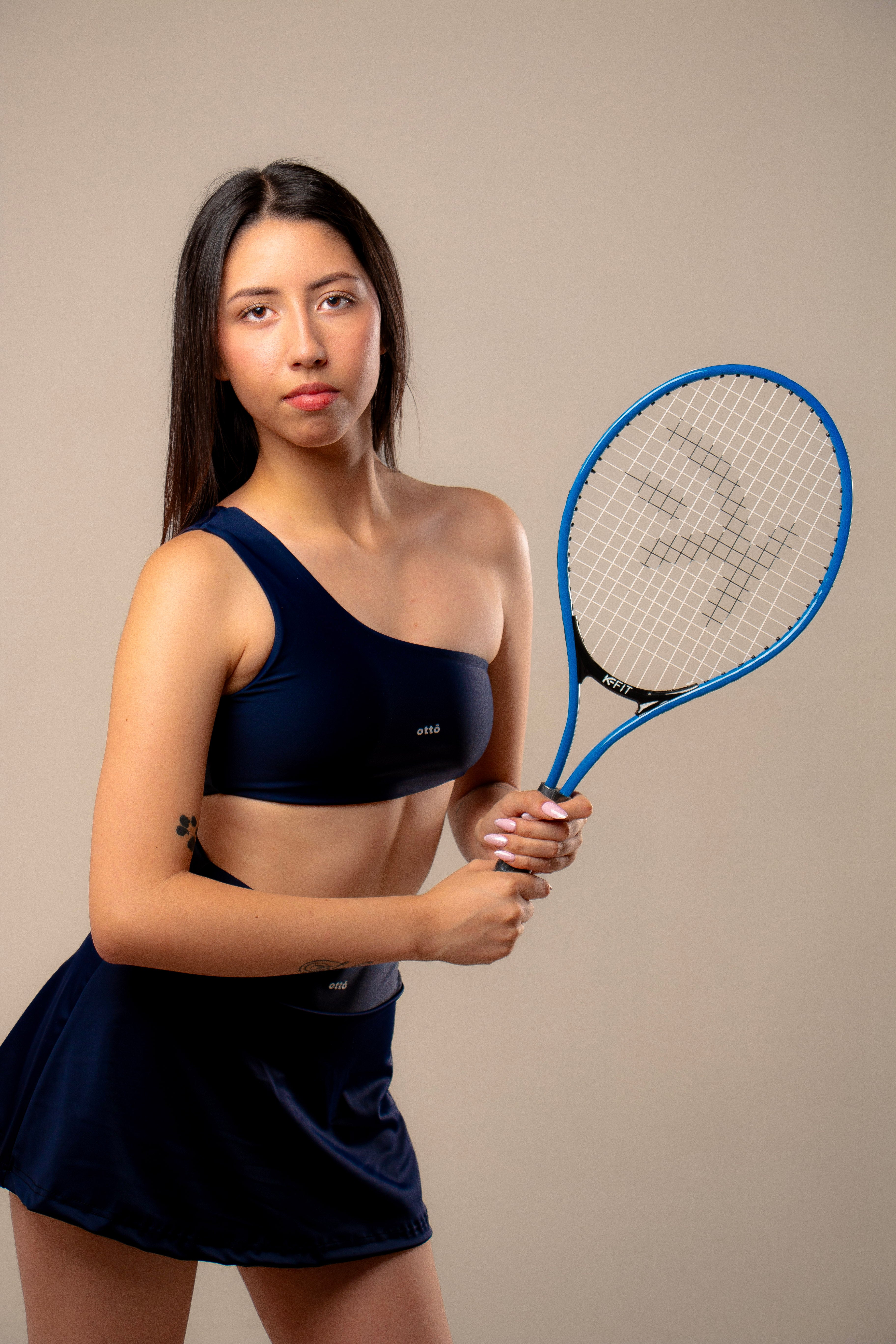 Conjuntos top  asimetrico + falda short